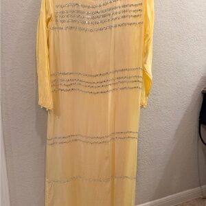 Lulusar’s Radiant Yellow Long Sleeve Dress with Silver Accents